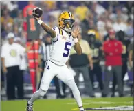  ?? ?? LSU quarterbac­k Jayden Daniels (5) passes Oct. 21 during a game against Army in Baton Rouge. In addition to his passing prowess, Daniels has rushed for 521 yards and 5 touchdowns this season. (AP/Gerald Herbert)