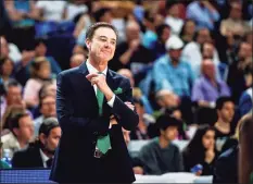  ?? Sonia Canada / Getty Images ?? Current Iona coach Rick Pitino is shown during the EuroLeague playoff match between Real Madrid and Panathinai­kos in 2019 in Madrid, Spain.