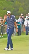  ?? AP PHOTO/ DAVID J. PHILLIP ?? Dustin Johnson waves after winning the 2020 Masters tournament in Augusta, Ga.