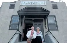  ?? DAVE JOHNSON/WELLAND TRIBUNE ?? Mandolin Orchestra member Wayne Hosick, left, and Clara Babiy, vice-president of Associatio­n of United Ukrainian said 150 people were expected to celebrate the 100th anniversar­y of Ukrainian Labor Temple, on Ontario Road, Sunday.