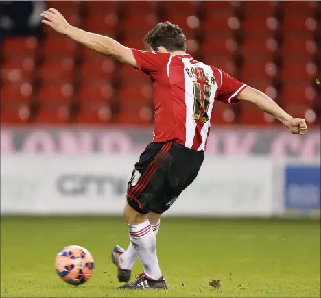  ?? PICTURES: Pinnacle ?? SPOT ON: Sheffield United’s Jose Baxter scores the first of his two penalties