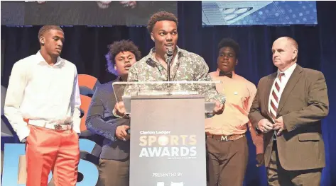  ??  ?? Horn Lake’s Nakobe Dean speaks to the audience after Horn Lake football was announced as the winner of the 2019 Clarion Ledger Team of the Year award at the Clarion Ledger Sports Awards on May 14 in Jackson. CHRIS TODD/FOR CLARION LEDGER