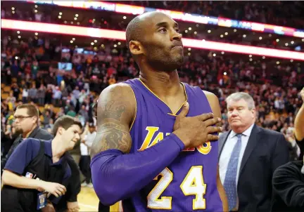  ?? WINSLOW TOWNSON — THE ASSOCIATED PRESS FILE ?? In this Dec. 30, 2015, file photo, Los Angeles Lakers’ Kobe Bryant touches his chest as he walks off the court in Boston after the Lakers’ 112-104win over the Boston Celtics in an NBA basketball game. Kobe Bryant’s legacy may be stronger than ever. Tuesday, Jan. 26, 2021, marks the anniversar­y of the crash that took the lives of Bryant, his daughter Gianna and seven other people.