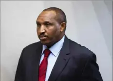  ?? Peter Dejong, ANP/AFP via Getty Images ?? Former Congolese militia leader Bosco “Terminator” Ntaganda looks on in the courtroom of the Internatio­nal Criminal Court in The Hague on Thursday, prior to the verdict.