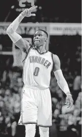  ?? [PHOTO BY
SARAH PHIPPS, THE OKLAHOMAN] ?? Thunder guard Russell Westbrook celebrates a 3-point basket during the game against the Sacramento Kings at Chesapeake Energy Arena.