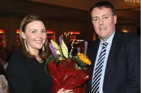  ??  ?? Emma Gilbey, recipient speaker being presented with flowers by Paul McKinney, Director of Operations Irish Blood Transfusio­n Service