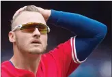  ?? The Canadian Press ?? Toronto Blue Jays third baseman Josh Donaldson makes his way back to the dug out at the end of first inning American League MLB action against the Houston Astros in Toronto on Sunday.