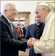  ?? AP/ALBERTO PIZZOLI ?? Pope Francis greets Palestinia­n leader Mahmoud Abbas during an audience Saturday at the Vatican.