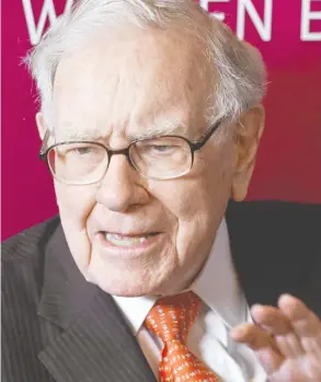  ?? NATI HARNIK / THE ASSOCIATED PRESS FILES ?? Warren Buffett's Berkshire businesses were hit by the pandemic in the third quarter,
contributi­ng to a 32-per-cent drop in operating profit.