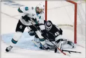  ?? ASHLEY LANDIS — THE ASSOCIATED PRESS, FILE ?? Kings goaltender Calvin Petersen (40) blocks a shot by Sharks center Tomas Hertl (48) during the first period on Feb. 11 in Los Angeles.