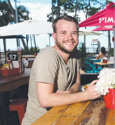  ??  ?? ATMOSPHERE: Darrin Walker and Betty O’Loughlin enjoy the outdoor dining set-up at