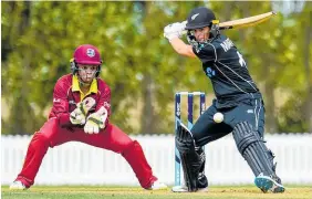  ?? Picture / Photosport ?? Katey Martin made her first T20 half century to help New Zealand to a tight win over the West Indies in Mt Maunganui yesterday.