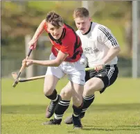  ?? Photograph: Neil Paterson. ?? Conor Golabek, Glenurquha­rt, gets away from Lovat’s Drew Howie.