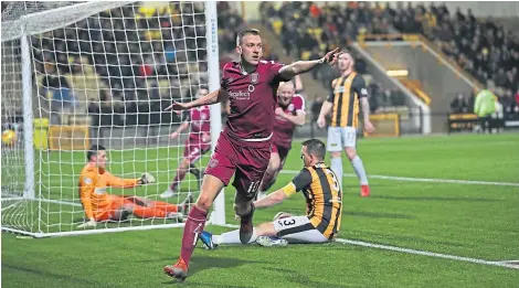  ?? Picture: Graham Black. ?? Luke Donnelly races away after grabbing a first-half equaliser for Dick Campbell’s side.