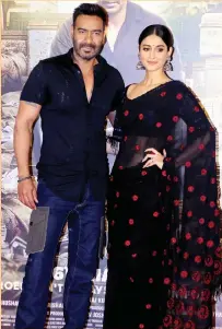  ??  ?? Ajay Devgn with Raid co-star Ilena Dsouza