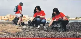  ??  ?? HSBC Malta employees making use of their Volunteer Leave day in cleaning up the Armier Bay beach during an event organised by the US Embassy, Nature Trust Malta and others