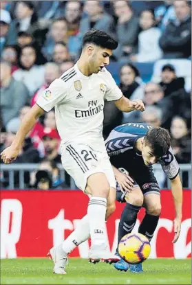 ?? FOTO: EFE ?? Marco Asensio durante un partido del Real Madrid en el Santiago Bernabéu