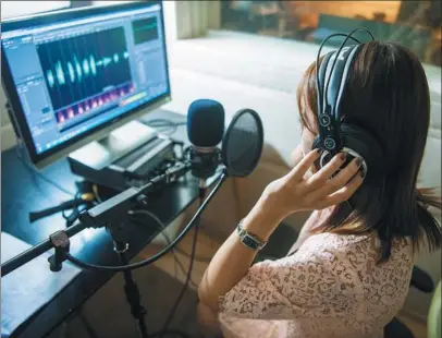  ?? PHOTOS PROVIDED TO CHINA DAILY ?? A female character voice, or CV, enthusiast, Ge Yuying, performs in a quiet studio in Beijing. More young people are listening to online audio dramas created by their peers.