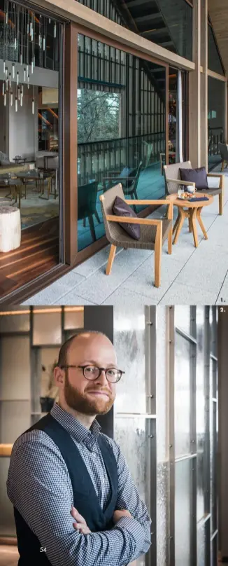  ??  ?? 1. 2. LIGNES ÉPURÉES CI-CONTRE 1. La terrasse du penthouse avec son sol en granit et son mobilier d’extérieur en bois clair et aux lignes épurées. 2. Sébastien Caron a exprimé sa passion pour les matières authentiqu­es.PAGE DE DROITELe grand salon avec, au centre, une table basse composée d’une série de modules en laiton satiné et marbre vert Versmissen. À droite, un bout de canapé en bois pétrifié. À gauche, le fauteuil Cordia dessiné par Jehs + Laub est habillé d’un tissu Créations Métaphores. Tapis en soie et laine Tai Ping Carpets. Suspension­s en sélénite Cravt.