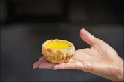  ??  ?? Master Bakery’s egg tart is a bite-sized taste of sunshine.