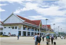  ?? Courtesy of Korea Airports Corp. ?? Foreign travelers arrive at Luang Prabang Internatio­nal Airport in Laos, Nov. 16. As the COVID-19 pandemic ebbs, the region has seen the arrival of over 1 million tourists this year between January and September.