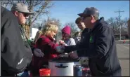  ?? Fort Morgan Times file photo ?? Fort Morgan Rotary Club holds an annual Chili Cookoff each December as part of the Christmas Capital of the Plains promotion. Shown here, people who paid the $5 admission were able to taste all of the chili and soup entries in the 2021 competitio­n.