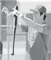  ?? RICK SCUTERI/USA TODAY ?? Shohei Ohtani is shown during a workout in Tempe.