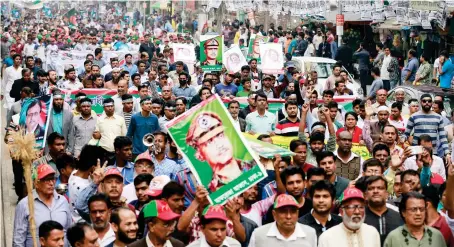  ??  ?? Jatiya Oikya Front supporters during a rally to mark Victory Day in Dhaka on Sunday. AP