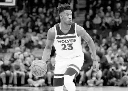  ?? JIM MONE/ASSOCIATED PRESS ?? Jimmy Butler, traded last summer to the Minnesota Timberwolv­es from the Chicago Bulls is a MVP contender. He averages 21.4 points and 5.4 rebounds.