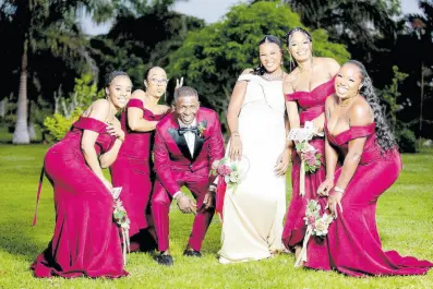  ?? ?? The groom, Joel Anderson, is surrounded by laughter and love from his wife’s bridesmaid­s (from left) Abigail Nugent, Stephanie Lyew, Saudia Flemmings (maid of honour), Ifunaya Anderson and Stacy-Ann Noble.