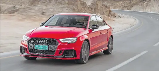 ?? PHOTOS: AUDI ?? An optional and unique tire setup — 255/30R19s in the front and 235/35R19s in the rear — has allowed Audi to solve its persistent understeer in the new 2018 RS3.