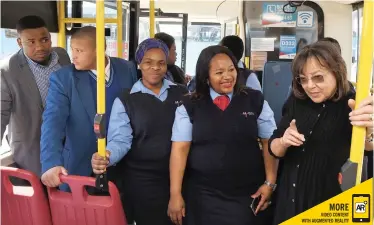  ?? PHANDO JIKELO African News Agency (ANA) ?? TO mark Transport Month, Cape Town mayor Patricia de Lille visited female MyCiTi employees yesterday. The visit formed part of an empowermen­t campaign aimed at celebratin­g women who are excelling in so-called ‘male-dominated’ industries. Siziwe Dase, second from right, was one of the bus drivers who showed her how she operated the bus. |