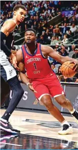  ?? — AFP ?? SAN ANTONIO: Zion Williamson of the New Orleans Pelicans drives to the basket during the game against the San Antonio Spurs on February 2, 2024 at the Frost Bank Center in San Antonio, Texas.