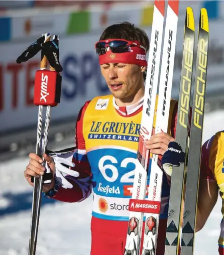  ??  ?? MILEPAEL: Martin Johnsrud Sundby jubler for triumfen på 15 kilometer klassisk i Seefeld-VM. Aleksandr Bessmertny­kh (t.v.)
