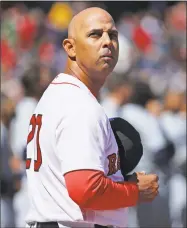  ?? Maddie Meyer / Getty Images ?? Red Sox manager Alex Cora was focussed before Thursday’s home opener at Fenway Park.