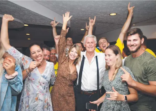  ??  ?? The Nationals’ Geoff Provest and supporters celebrate him retaining Tweed in the NSW election.