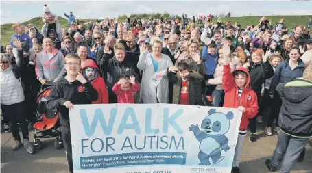  ??  ?? Families take part in the Walk for Autism at Herrington Country Park.