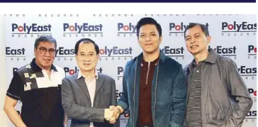  ??  ?? TJ with PolyEast Records bosses (from left) Chito Ilagan, A&R director; Ramon Chuaying, president; and Jesmon Chua, general manager