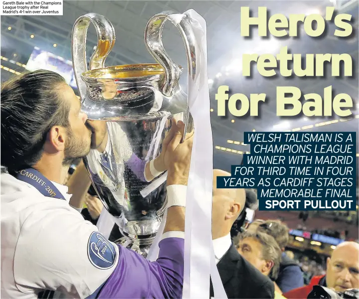  ??  ?? Gareth Bale with the Champions League trophy after Real Madrid’s 4-1 win over Juventus