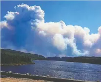  ?? ALEXANDRE SERGERIE-GAUDREAULT ?? Smoke plumes from a massive forest fire burning north of Lac-saint-jean are pictured on Thursday.