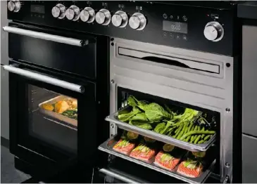  ??  ?? AT A TOUCH Enjoy the latest oven technology along with dualfuel sources at the touch of a button. Switch between cooking functions and timers with an easy-to-navigate touch LED screen.