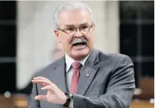  ?? The Canadian Press/files ?? Minister of Agricultur­e Gerry Ritz said in an email the federal government will turn to retaliatio­n if necessary to oppose the U.S. law.