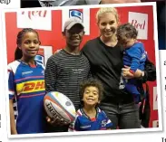  ??  ?? FAMILY: Siya Kolisi’s wife, Rachel, with their children and his half-siblings