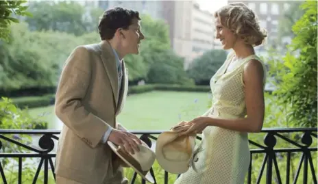  ?? SABRINA LANTOS/TRIBUNE NEWS SERVICE ?? Jesse Eisenberg as Bobby, the Woody Allen stand-in, and Blake Lively explore 1930s Hollywood in Allen’s Cafe Society.