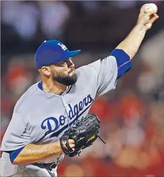 ?? Billy Hurst Associated Press ?? AFTER STARTING THE SEASON in triple A, Adam Liberatore has emerged as the go-to lefthander in Dodgers’ bullpen. He made 28 straight appearance­s without allowing a run, a club record.