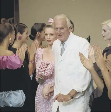  ??  ?? 0 Hubert de Givenchy, designer of Audrey Hepburn’s ‘little black dress’ from Breakfast at Tiffany’s, also forged friendship­s with famous clients like Iman