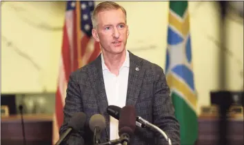  ?? Sean Meagher / Associated Press ?? In this Aug. 30, 2020, photo, Portland Mayor Ted Wheeler speaks during a news conference.