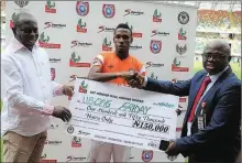  ??  ?? From right, Mr. Agu Benedict, FIRS State Coordinato­r in charge of Akwa Ibom and Cross Rivers States, VAT Wonder Goal winner and Akwa United player, Friday Ubong and Elder Paul Bassey, Chairman, Akwa United at the presentati­on ceremony of NPFL Match Day...