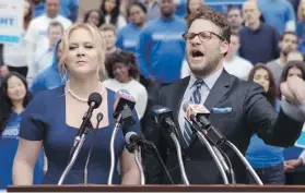  ?? ANHEUSER-BUSCH ?? Amy Schumer and Seth Rogen in the Bud Light Party campaign spot for Super Bowl 50. Advertiser­s are paying close to $5 million per 30-second spot.