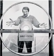  ??  ?? Jones, aka Daedalus of DREADCO, standing behind one of his ‘perpetual motion’ machines: many scientists who should have known better were taken in